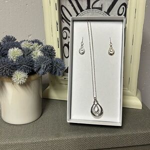 New in box silver necklace and earrings